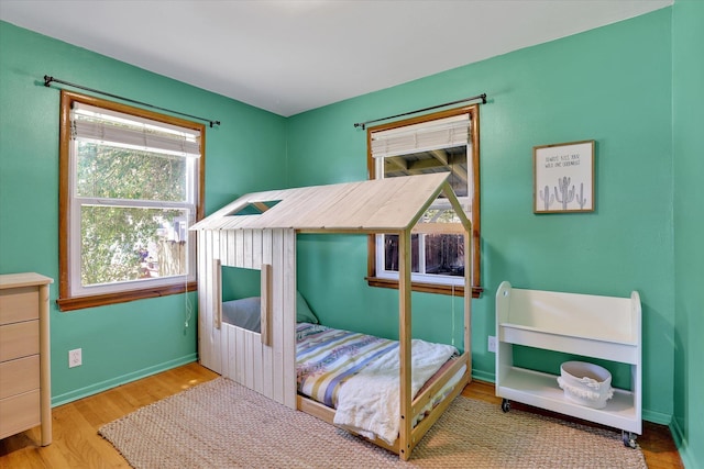 3526 W Hoffman Ave, Spokane, WA 99205 - bedroom with wood finished floors and baseboards