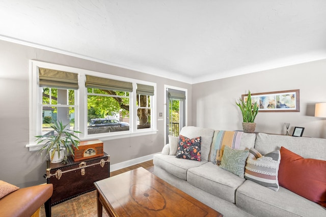 617 E 34th Ave, Spokane, WA 99203 - living area with baseboards and wood finished floors