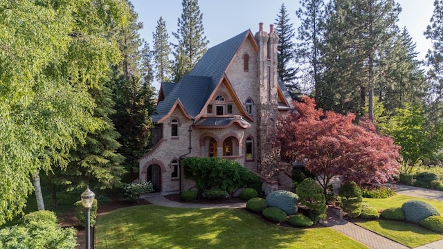 2010 E Pinecrest Rd, Spokane, WA 99203 - view of front of house with a front yard and brick siding
