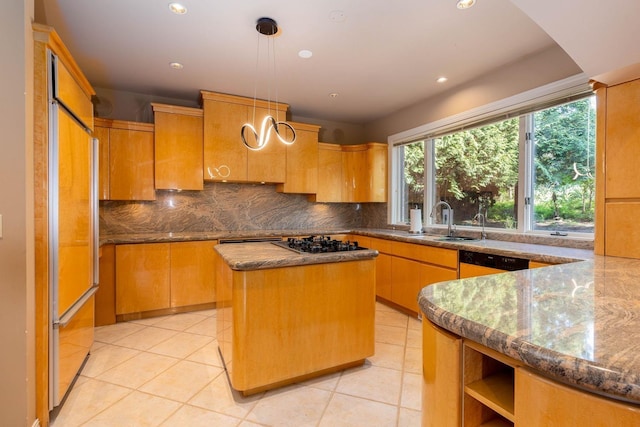2010 E Pinecrest Rd, Spokane, WA 99203 - kitchen with backsplash, black gas cooktop, recessed lighting, paneled refrigerator, and light tile patterned floors