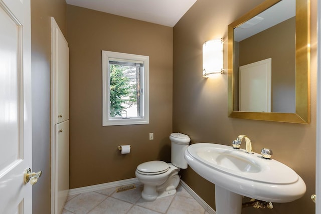 2010 E Pinecrest Rd, Spokane, WA 99203 - half bathroom with toilet and tile patterned flooring