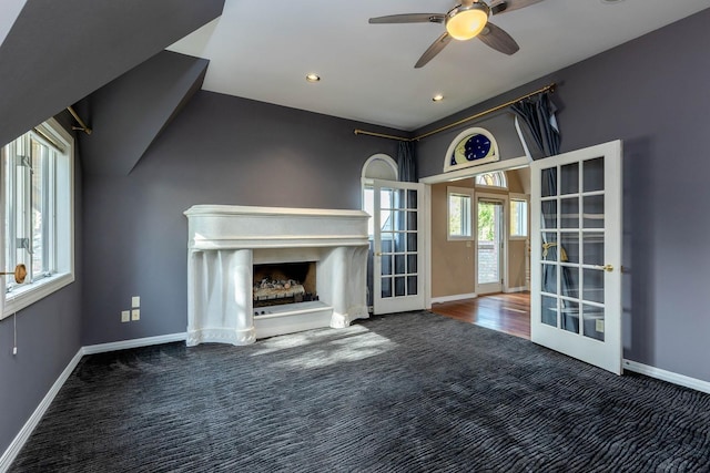 2010 E Pinecrest Rd, Spokane, WA 99203 - unfurnished living room with carpet flooring, a ceiling fan, french doors, a fireplace, and recessed lighting