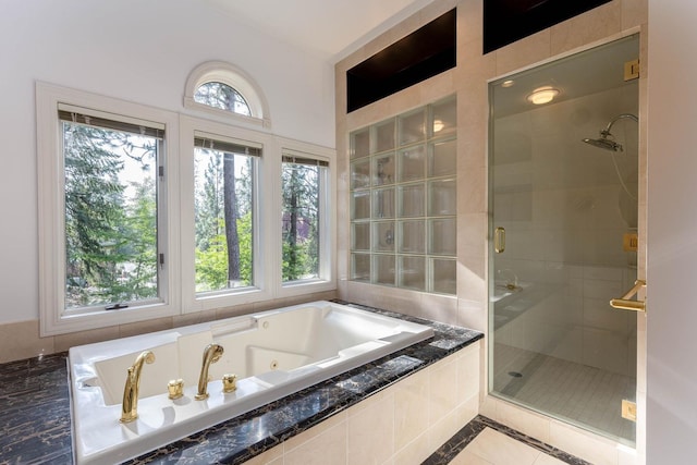 2010 E Pinecrest Rd, Spokane, WA 99203 - full bath featuring a stall shower, a jetted tub, and tile patterned flooring