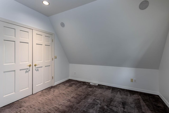 2010 E Pinecrest Rd, Spokane, WA 99203 - additional living space with lofted ceiling, dark colored carpet, and recessed lighting