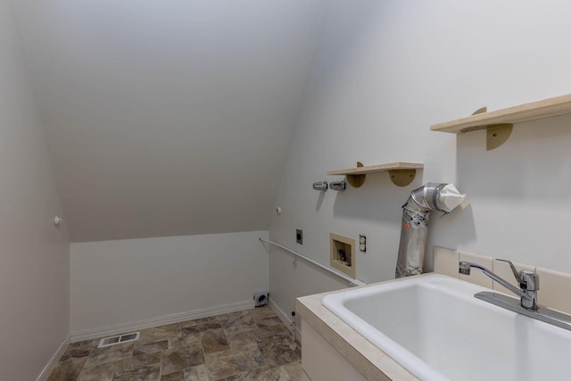 2010 E Pinecrest Rd, Spokane, WA 99203 - washroom featuring electric dryer hookup, hookup for a washing machine, and stone finish flooring