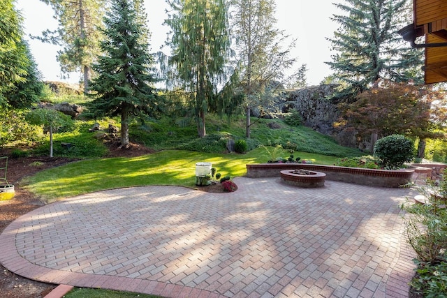 2010 E Pinecrest Rd, Spokane, WA 99203 - view of patio / terrace with a fire pit