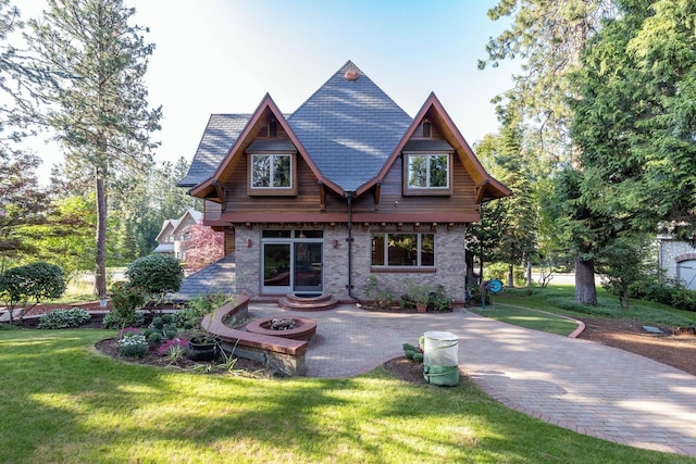 2010 E Pinecrest Rd, Spokane, WA 99203 - rear view of house with a yard, a patio area, and brick siding
