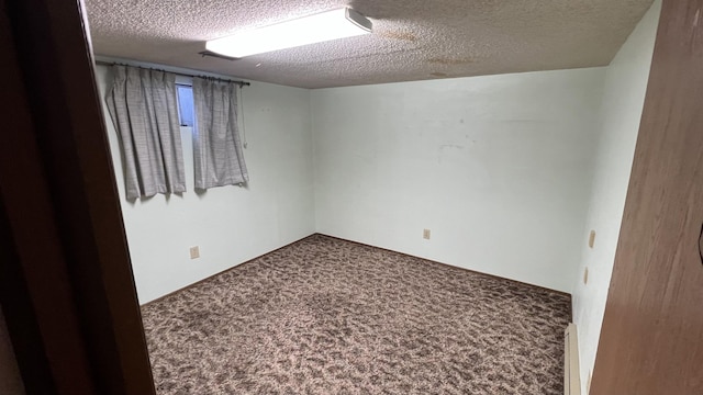 3520 N Arden Rd, Otis Orchards, WA 99027 - unfurnished room with carpet and a textured ceiling