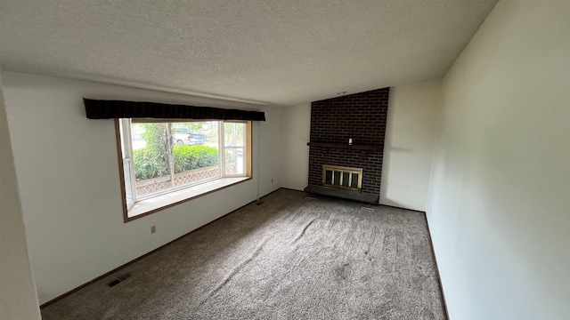 3520 N Arden Rd, Otis Orchards, WA 99027 - unfurnished living room with carpet flooring, a brick fireplace, a textured ceiling, and lofted ceiling