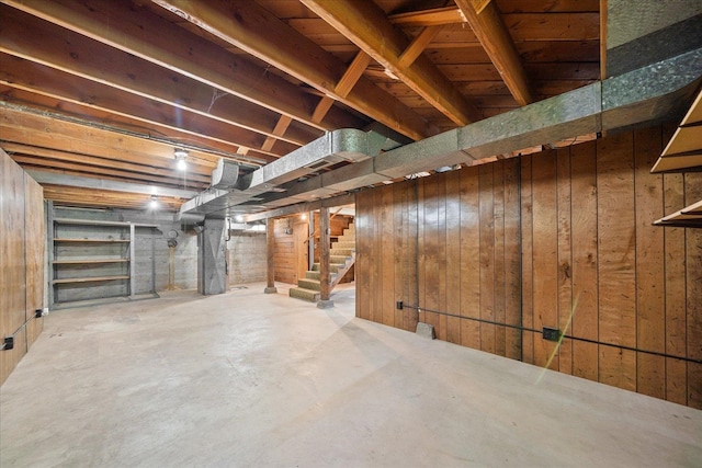 5327 N Jefferson St, Spokane, WA 99205 - unfinished basement with stairs and wooden walls