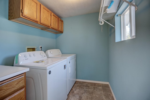 3222 W 4th Ave, Spokane, WA 99224 - washroom featuring cabinet space and independent washer and dryer