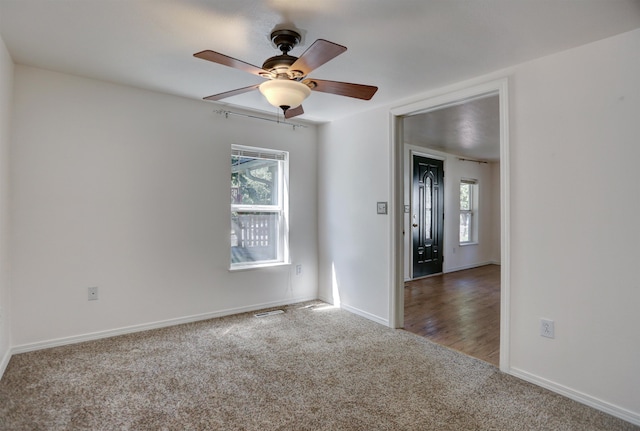 3222 W 4th Ave, Spokane, WA 99224 - carpeted spare room with plenty of natural light and ceiling fan