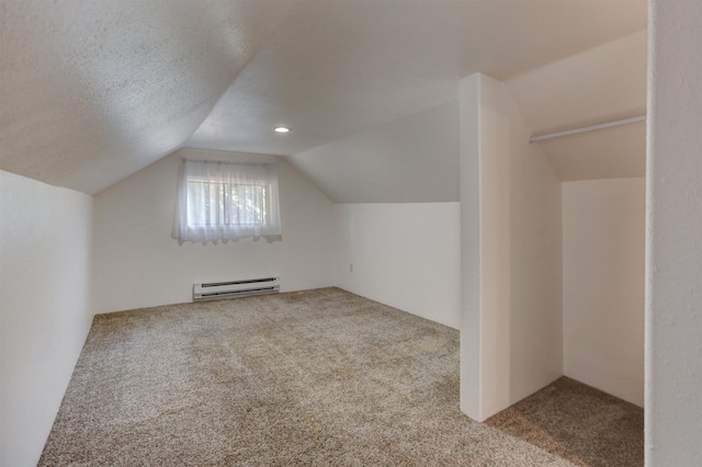 3222 W 4th Ave, Spokane, WA 99224 - bonus room featuring a baseboard heating unit, carpet flooring, and vaulted ceiling