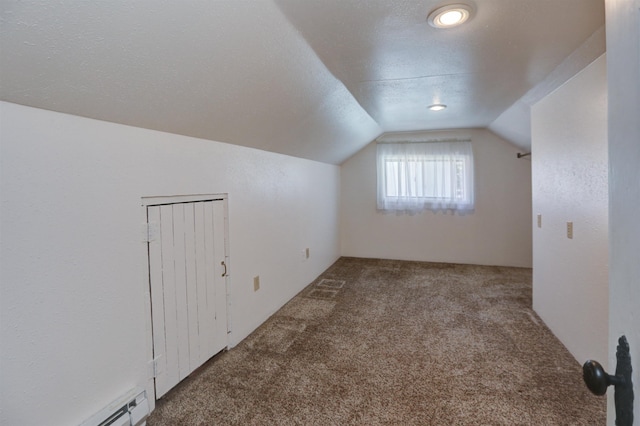 3222 W 4th Ave, Spokane, WA 99224 - bonus room featuring carpet flooring, vaulted ceiling, and baseboard heating