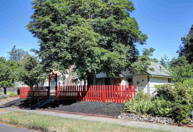 3222 W 4th Ave, Spokane, WA 99224 - obstructed view of property featuring a fenced front yard