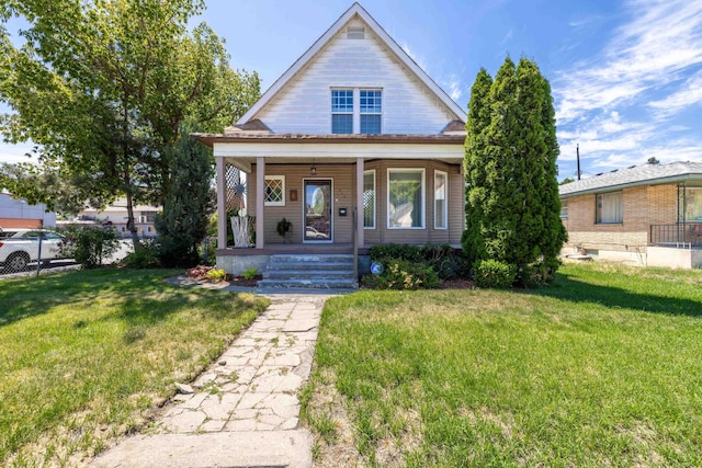814 E Montgomery Ave, Spokane, WA 99207 - bungalow-style home featuring a porch and a front yard