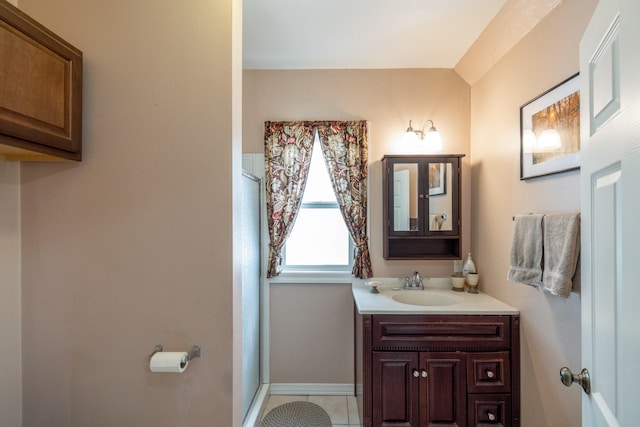 814 E Montgomery Ave, Spokane, WA 99207 - bathroom with vanity, a stall shower, and tile patterned flooring