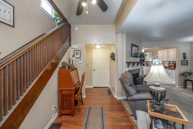 814 E Montgomery Ave, Spokane, WA 99207 - living area featuring stairs, wood finished floors, and ceiling fan