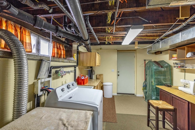 814 E Montgomery Ave, Spokane, WA 99207 - basement featuring washing machine and dryer and carpet