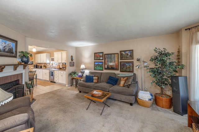 814 E Montgomery Ave, Spokane, WA 99207 - living area featuring light colored carpet, a fireplace, and light tile patterned floors