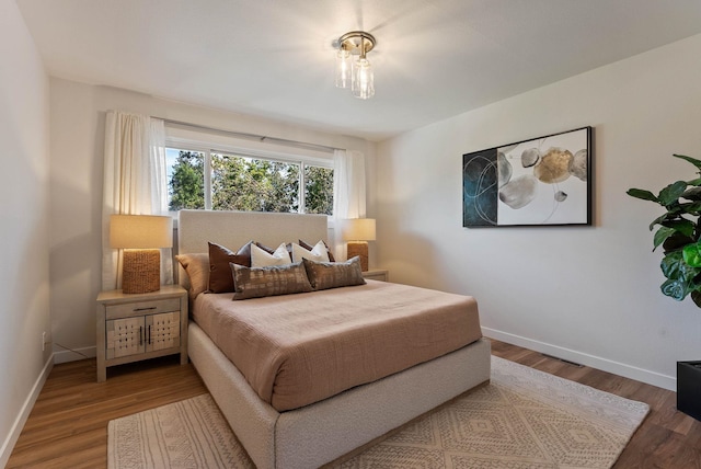 4017 E Pratt Ave, Spokane, WA 99204 - bedroom featuring baseboards and wood finished floors