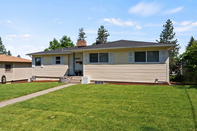 4017 E Pratt Ave, Spokane, WA 99204 - view of front facade with a front lawn and a chimney