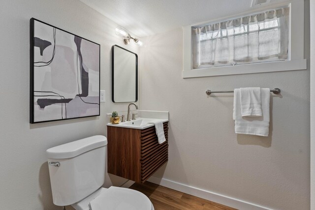 4017 E Pratt Ave, Spokane, WA 99204 - bathroom featuring vanity and wood finished floors