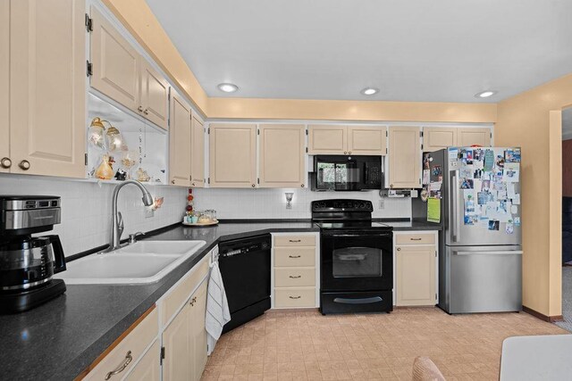 4335 W Excell Ave, Spokane, WA 99208 - kitchen featuring black appliances, dark countertops, decorative backsplash, and recessed lighting