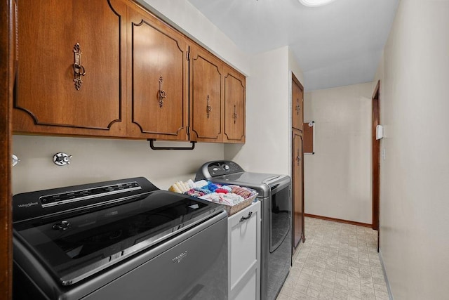 4335 W Excell Ave, Spokane, WA 99208 - washroom featuring washing machine and clothes dryer and cabinet space