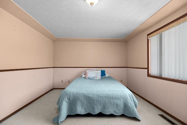 4335 W Excell Ave, Spokane, WA 99208 - carpeted bedroom featuring a textured ceiling