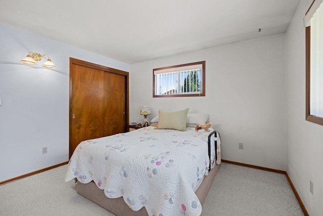 4335 W Excell Ave, Spokane, WA 99208 - carpeted bedroom featuring a closet and baseboards