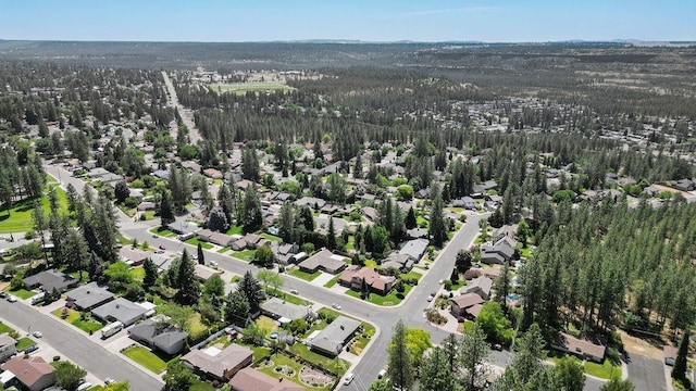 4335 W Excell Ave, Spokane, WA 99208 - aerial view of property and surrounding area with nearby suburban area and a heavily wooded area