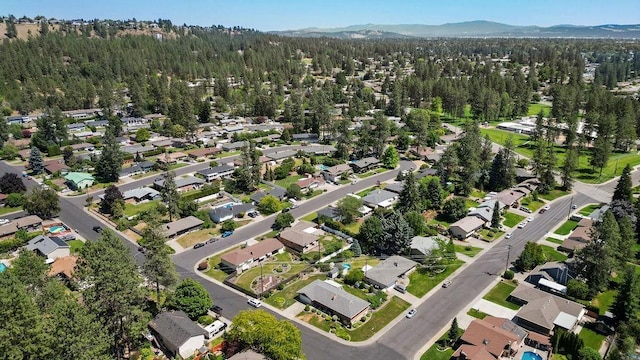 4335 W Excell Ave, Spokane, WA 99208 - aerial view of property's location with a mountainous background and nearby suburban area