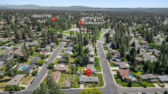 4335 W Excell Ave, Spokane, WA 99208 - aerial view of property and surrounding area featuring nearby suburban area and mountains