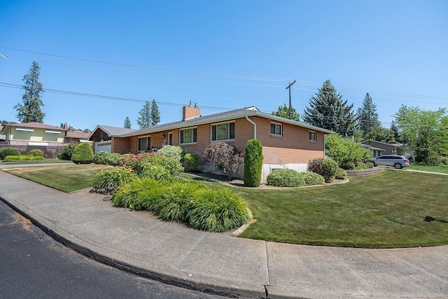 4335 W Excell Ave, Spokane, WA 99208 - ranch-style house featuring brick siding, a front lawn, a chimney, and an attached garage