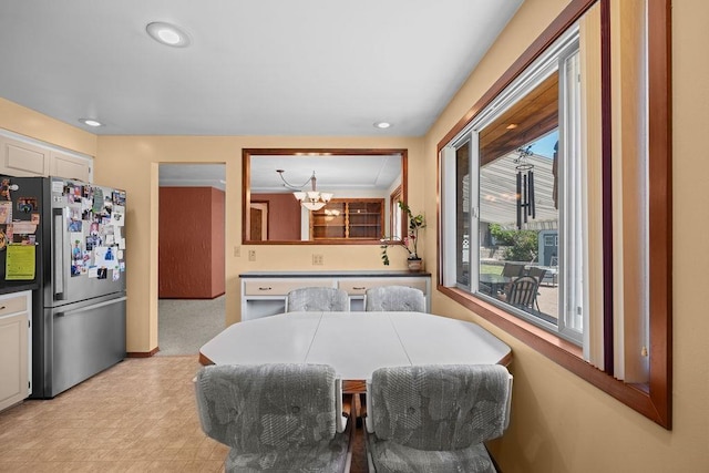 4335 W Excell Ave, Spokane, WA 99208 - dining room with a chandelier, recessed lighting, and light floors