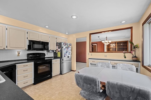 4335 W Excell Ave, Spokane, WA 99208 - kitchen with black appliances, a chandelier, dark countertops, light flooring, and tasteful backsplash