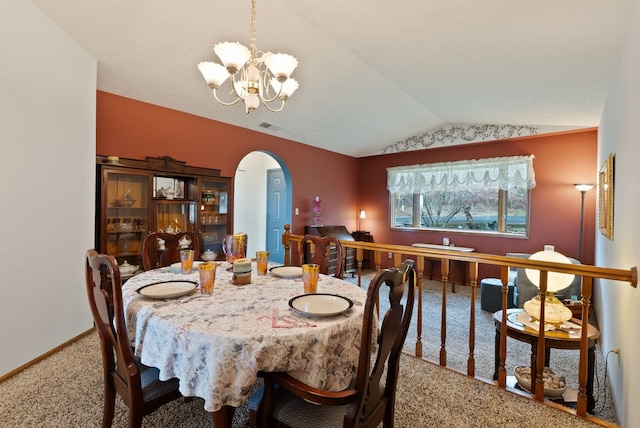 3314 W Eagles Nest Ln, Spokane, WA 99208 - carpeted dining room featuring arched walkways, lofted ceiling, and a chandelier