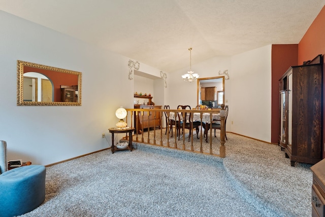 3314 W Eagles Nest Ln, Spokane, WA 99208 - dining area featuring a chandelier, carpet flooring, and lofted ceiling