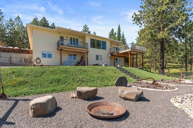 3314 W Eagles Nest Ln, Spokane, WA 99208 - back of property featuring stairs and a balcony
