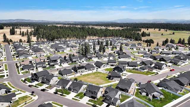 1119 S Soda Rd, Spokane, WA 99224 - aerial view of property and surrounding area with nearby suburban area and a mountainous background