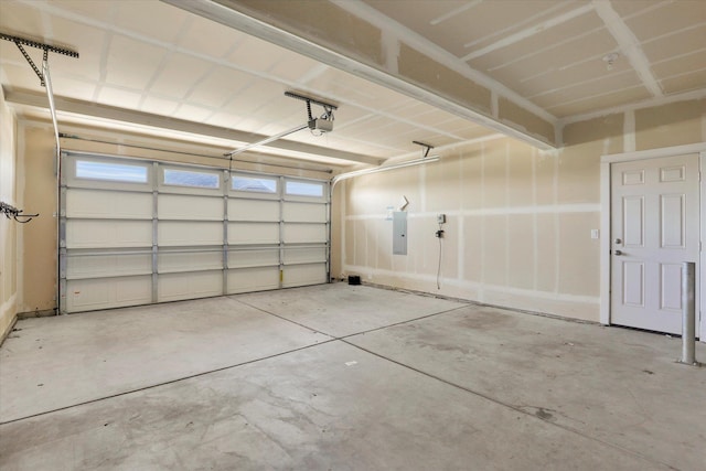 1119 S Soda Rd, Spokane, WA 99224 - garage featuring electric panel and a garage door opener