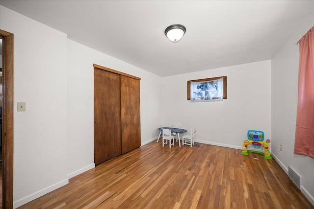7616 E Baldwin Ave, Spokane, WA 99212 - unfurnished bedroom featuring wood finished floors and a closet