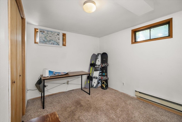 7616 E Baldwin Ave, Spokane, WA 99212 - rec room featuring a baseboard radiator and carpet