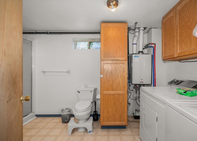 7616 E Baldwin Ave, Spokane, WA 99212 - bathroom featuring washer and clothes dryer, water heater, tile patterned floors, and a stall shower