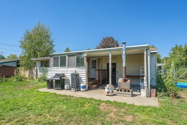 7616 E Baldwin Ave, Spokane, WA 99212 - rear view of house featuring a patio