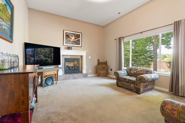 9617 N Northview Ln, Spokane, WA 99208 - carpeted living area featuring a tiled fireplace and baseboards