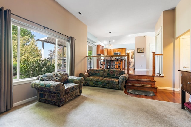 9617 N Northview Ln, Spokane, WA 99208 - carpeted living area with a chandelier and healthy amount of natural light