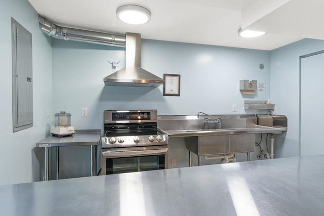 9617 N Northview Ln, Spokane, WA 99208 - kitchen featuring stainless steel countertops, wall chimney exhaust hood, stainless steel electric range, and electric panel