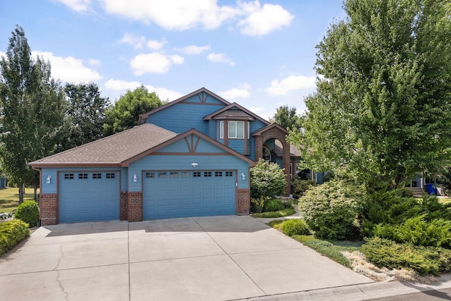 9617 N Northview Ln, Spokane, WA 99208 - view of front of property with brick siding, concrete driveway, and a garage